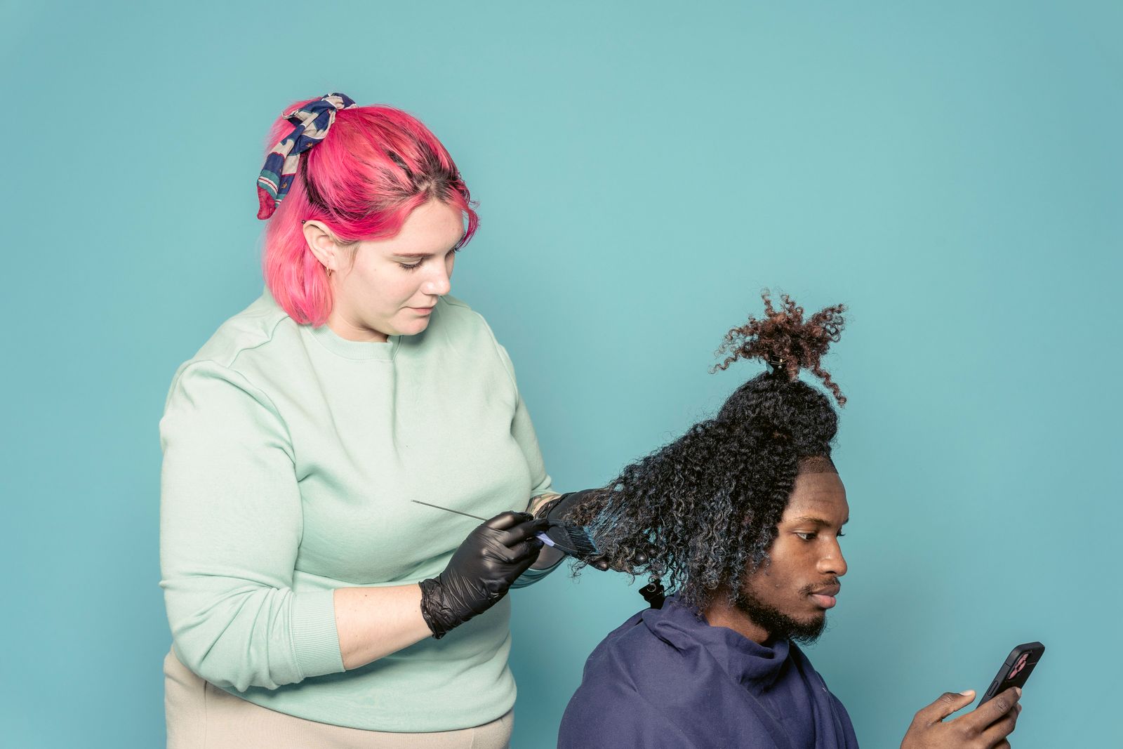 A service-business owner attending to a customer